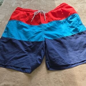 Vibrant Men's Swim Trunks in Red, Blue, and Navy